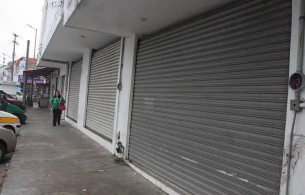 percianas bajas negocio cerrado